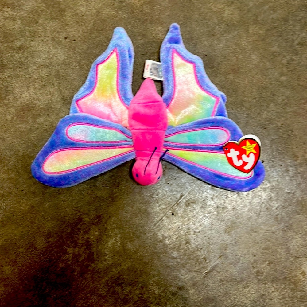Flitter the butterfly from the beanie babies collection. Gray condition!